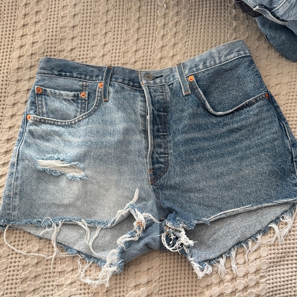 Levi’s 501 Distressed Blue Denim Shorts